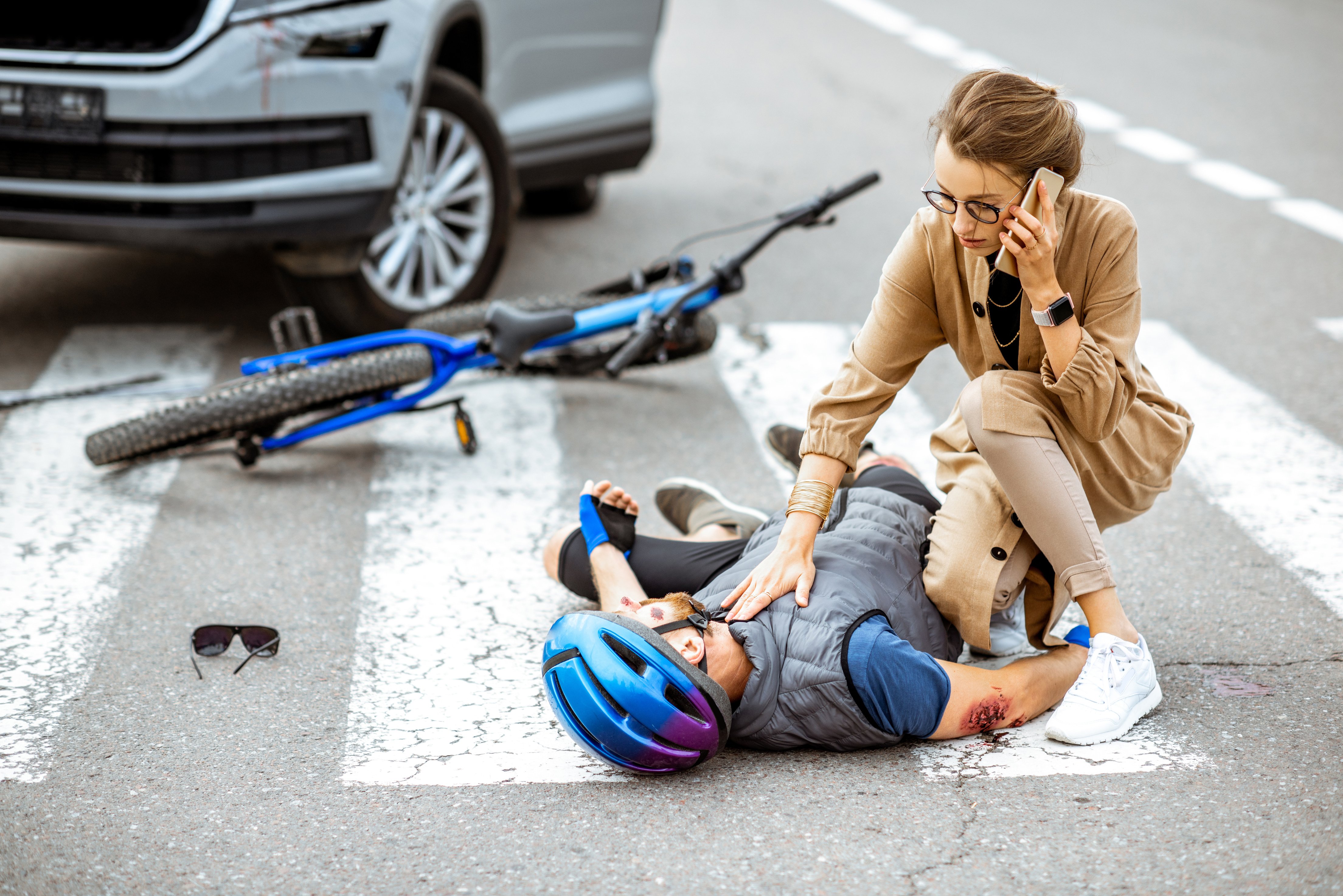 Road Accident with Injured Cyclist and Car Driver